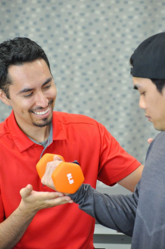 physical therapist working with a patient